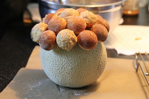 Donut Holes in a cantaloupe bowl