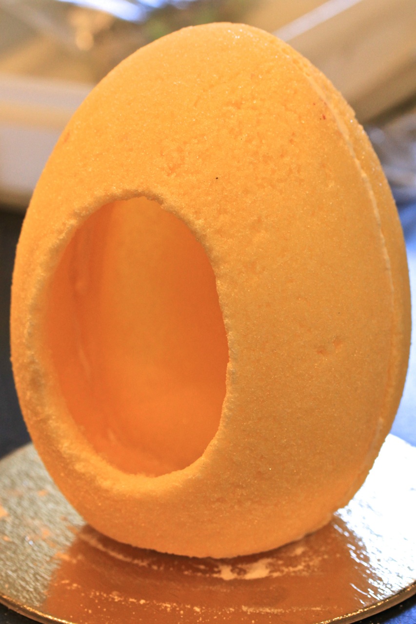 yellow sugar egg with hole cut out