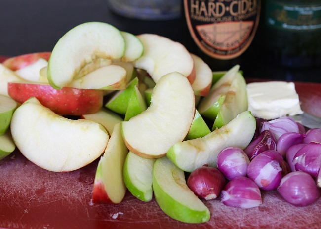 Pork loin, salt, pepper, butter, shallots, apples, flour, garlic, hard cider, & caraway seed 